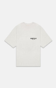 Fear of God Essentials Tee Light Oatmeal, front view with black ESSENTIALS chest logo